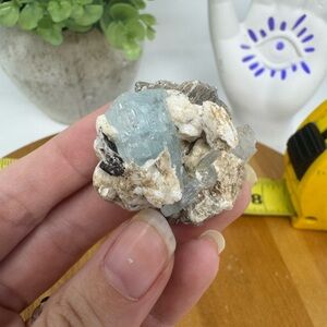 Aquamarine with tourmaline and mica